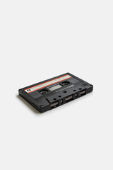 Old audio cassette isolated on white background.