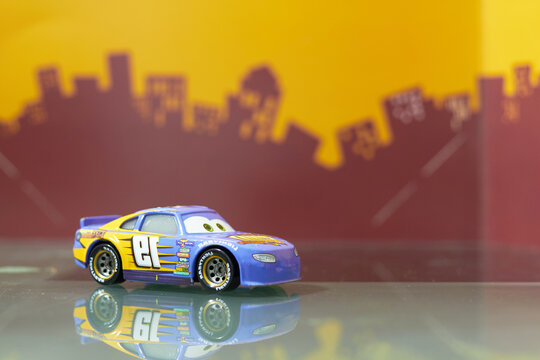 Bangkok,Thailand ,Feb 22,2022;cars character cartoon car toy selective focus on blur city background