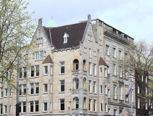 Fototapeta na wymiar Amsterdam Raadhuisstraat Street and Herengracht Canal White Corner Building, Netherlands