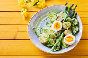 Palatable asparagus salad with eggs and potatoes