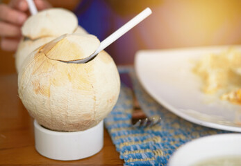peeled coconut juice on eating table