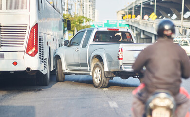 Pick-up truck bump Bus by accident on traffic road