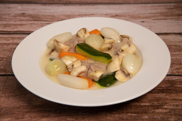 Veal stew and rice recipe, vegetable flower girl. High quality photo