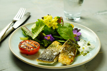 Wildflower salad with sea bream