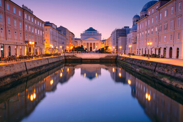 Trieste, Italy. Cityscape image of downtown Trieste, Italy at sunrise. - obrazy, fototapety, plakaty