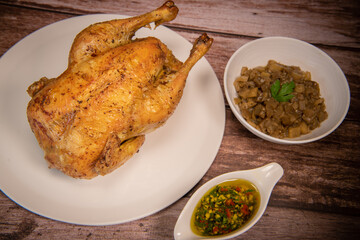 Recipe roast chicken, garlic chimichurri, stewed eggplant. High quality photo