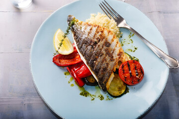 Grilled sea ​​bream fillet with vegetables