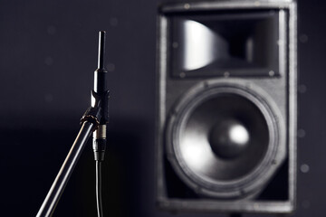 Sound acoustic testing in studio. The noise meter measures the volume of the speakers and the...