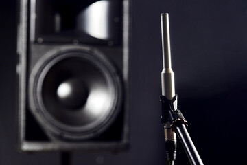 Sound acoustic testing in studio. The noise meter measures the volume of the speakers and the...
