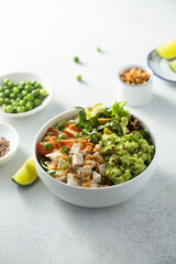 Healthy bowl with chicken and avocado