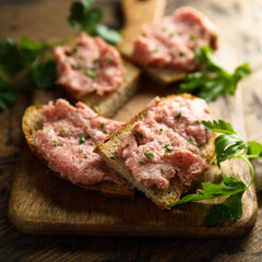 Traditional pork pate or sausage on a white bread