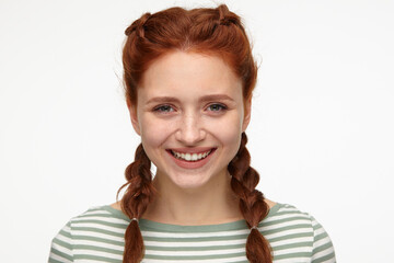 young positive ginger young female smiling