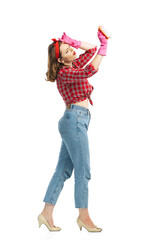 Studio shot of young emotional girl, housewife wearing homewear in 70s, 80s fashion style isolated...