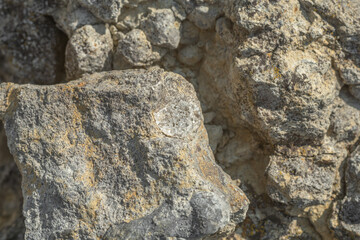 Quartz crystals in stone, close-up. Raw quartz in a mine in stone.