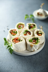 Homemade salmon wraps with fresh salad