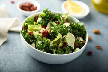 Healthy kale salad with cranberry and almond