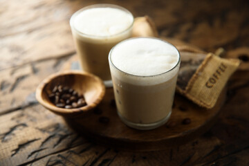 Iced coffee drink with milk foam