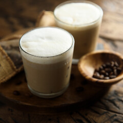 Iced coffee drink with milk foam