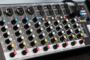 Audio sound mixer amplifier equipment, acoustic musical mixing engineering concept. Sound controller for mastering radio and television broadcasting. Multi-Channel Mix Processor. Close up.
