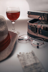 A romantic note, a message before a long journey or travel sketches on a journey, memoirs, with a suitcase, a glass of wine