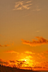 Sea shore at sunset, orange sky