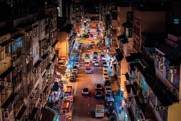 Kowloon City: Night of busy street, many people and cars, downtown of Kowloon City District, Hong...