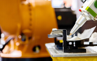 Robotic arm for engraving in factory