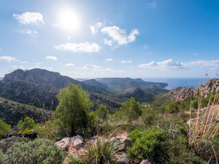 Fototapeta na wymiar The Serra de Tramuntana mountain landscape with hiking trail going to the sea on Mallorca, Balearic Islands, Spain, Europe