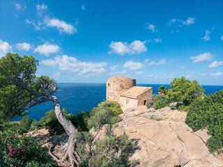 View over the old terraces and ruins of la Trapa monastery nearby Sant Elm on hiking route GR 221,...