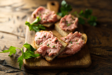 Traditional pork pate or sausage on a white bread