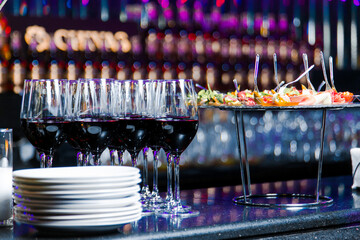 Decorated catering banquet table with different food appetizers assortment on a party