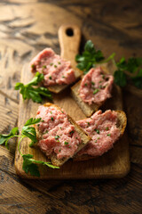 Traditional pork pate or sausage on a white bread