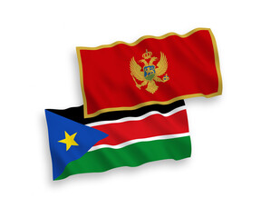 National vector fabric wave flags of Montenegro and Republic of South Sudan isolated on white background. 1 to 2 proportion.