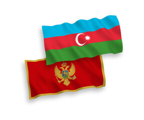 National vector fabric wave flags of Montenegro and Azerbaijan isolated on white background. 1 to 2 proportion.