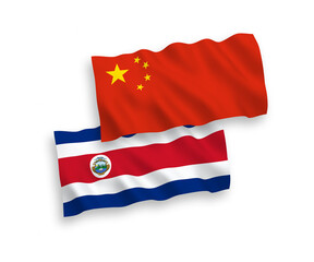 National vector fabric wave flags of Republic of Costa Rica and China isolated on white background 1 to 2 proportion.