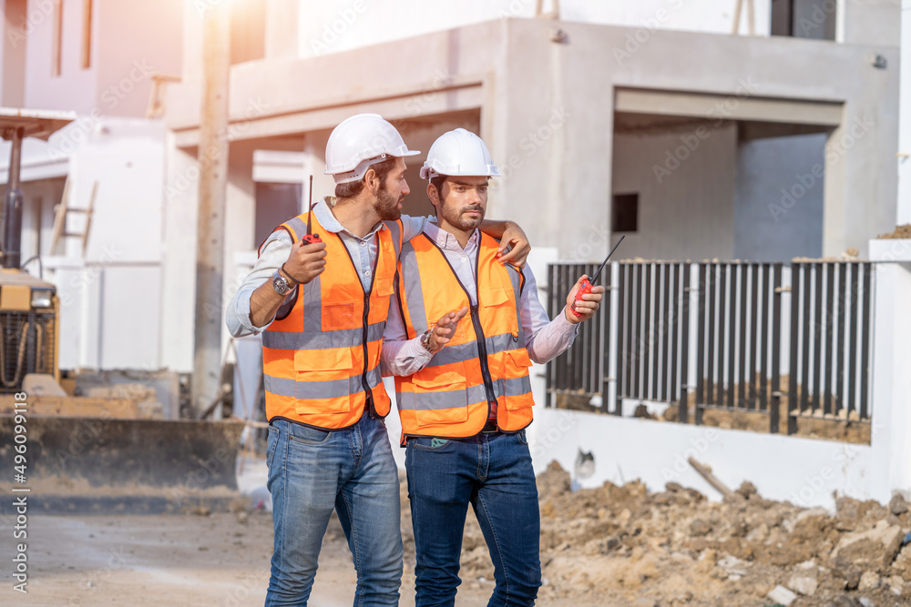 Poster architect and engineer discussing planning for a building a new home at construction site,architect 