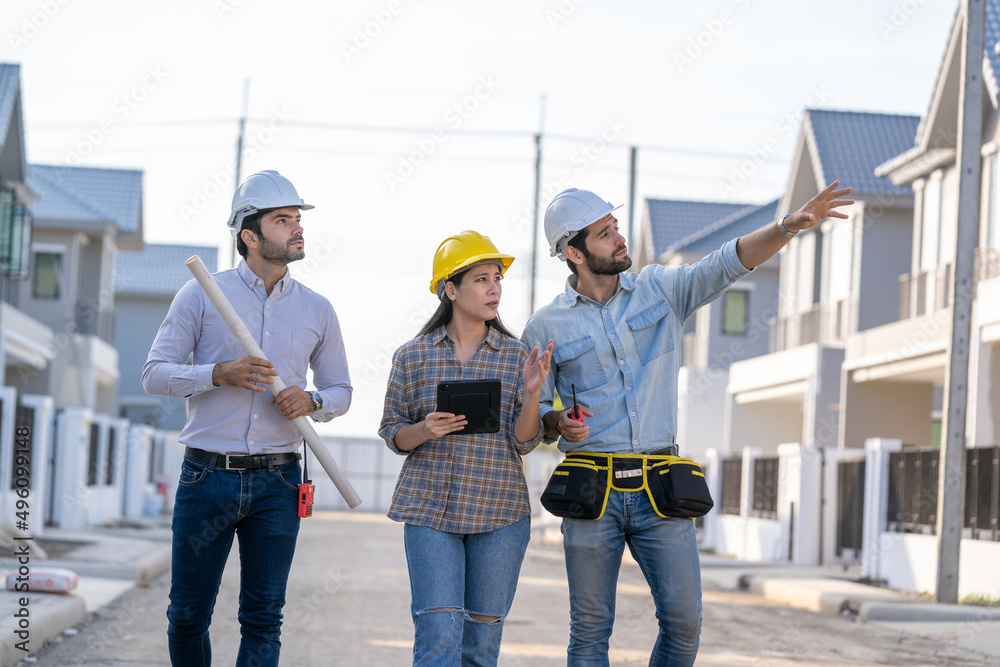Poster Group of builders in working uniform are working on a building site,Civil engineer project construction work.