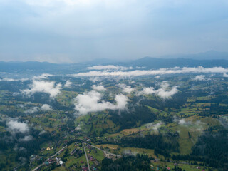 High flight in the mountains of the Ukrainian Carpathians. Aerial drone view.