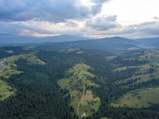 Green Ukrainian Carpathians mountains in summer. Aerial drone view.