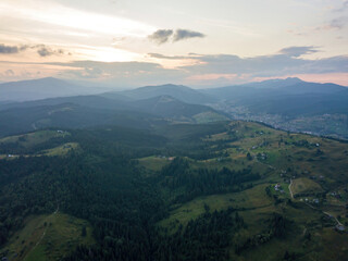 Sunset over the mountains in the Ukrainian Carpathians. Evening. Aerial drone view.