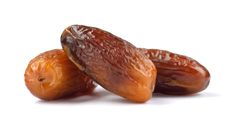 Three delicious dried dates are isolated on a white background. Full clipping path.