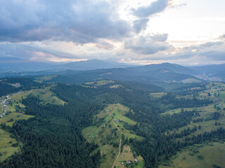 Fototapeta na wymiar Green Ukrainian Carpathians mountains in summer. Aerial drone view.