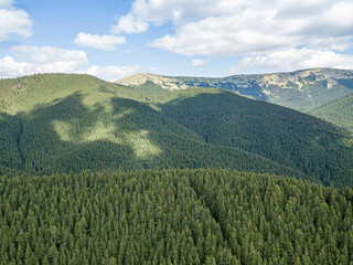 High mountains of the Ukrainian Carpathians in sunny weather. Aerial drone view.