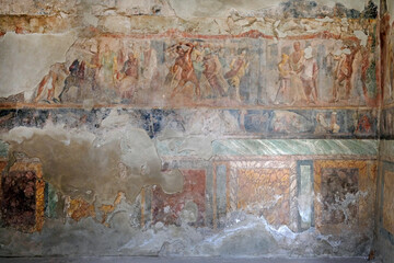Wall paintings in the ruins of the ancient Roman city of Pompeii in Italy