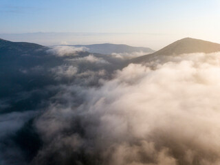 Morning fog in the Ukrainian Carpathians. Aerial drone view.