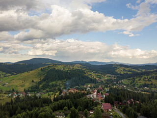 Fototapeta na wymiar Ukrainian Carpathians mountains on a summer morning. Aerial drone view.