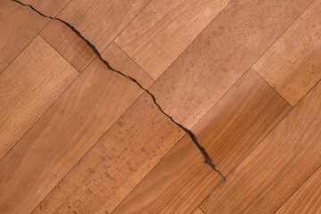 Broken torn linoleum old rubber PVC floor damage material, flooring repair