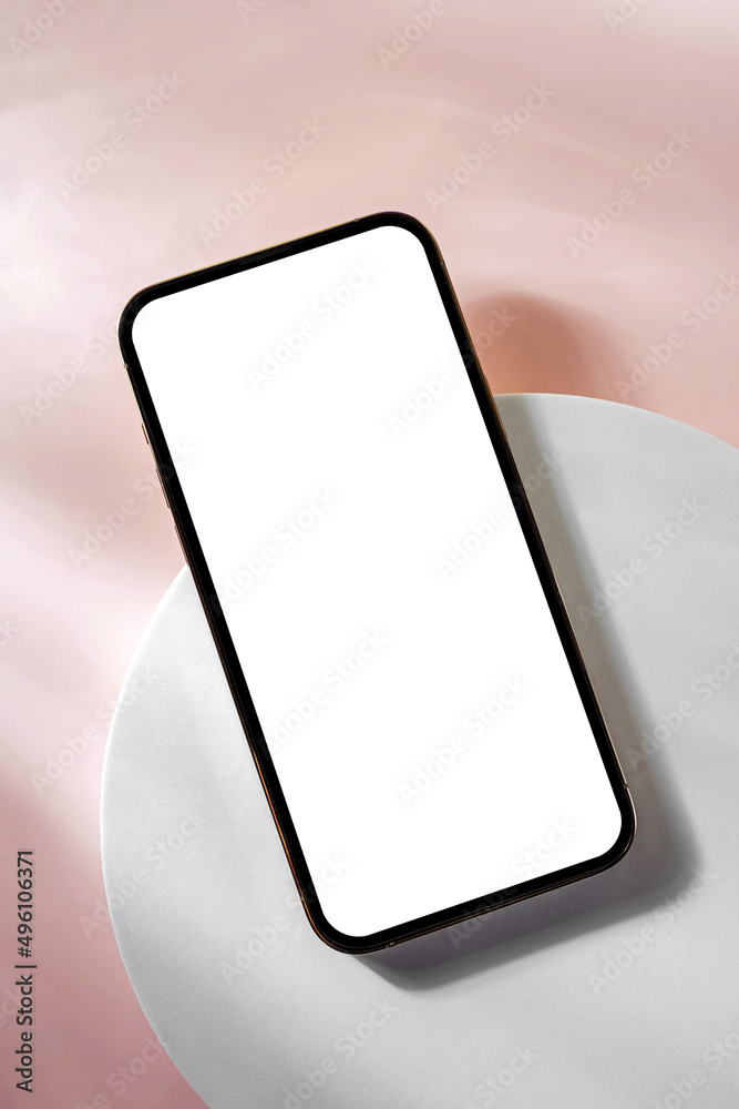 Wall mural smartphone with blank black screen. mobile phone with a round geometric shape. device screen mockup 