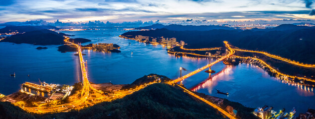 Naklejka premium Evening of Tsing Ma Bridge, 14th longest span suspension bridge in the world, Hong Kong