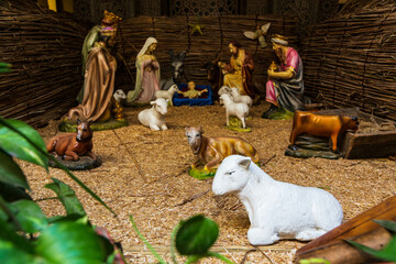 The holy family Christ child Christmas crib Christmas nativity scene birth of baby Jesus with...